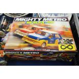 A Might Metro Scalextric set, with tracks, controls, cars and power unit, boxed