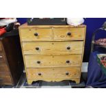 A pine chest of two short over three long drawers