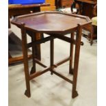 An oak folding occasional table