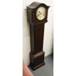 An oak cased Grandmother clock