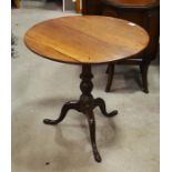A 19th Century mahogany tip up tripod table.