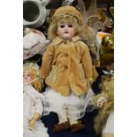 Max Handwerck bisque head doll, wigged, feathered