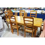 A French style oak dining table with parquetry inl