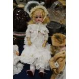 Armand Marseille doll, porcelain head with brown g