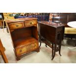 A mahogany cabinet fitted two drawers above apertu