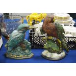 Two painted cast metal doorstops, parrot and kingf