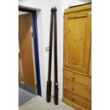 A pair of mahogany pillasters/bed canopy supports.