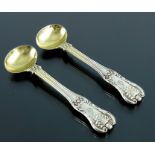 A pair of George IV Scottish silver salt spoons