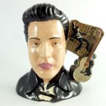 A Royal Doulton large character jug, Elvis Presley Jail House Rock, silver and gold highlights colou