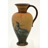 Florence Barlow (attributed) for Doulton Lambeth, a pate sur pate stoneware jug