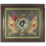 A George V gold thread embroidered picture, the central portrait of the Duke and Duchess of York