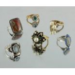 A collection of rings including 18 carat gold and white stone ring