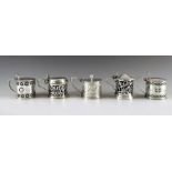 Five English silver mustard pots, with date marks from 1900 to 1924, various makers, Chester, Birmin