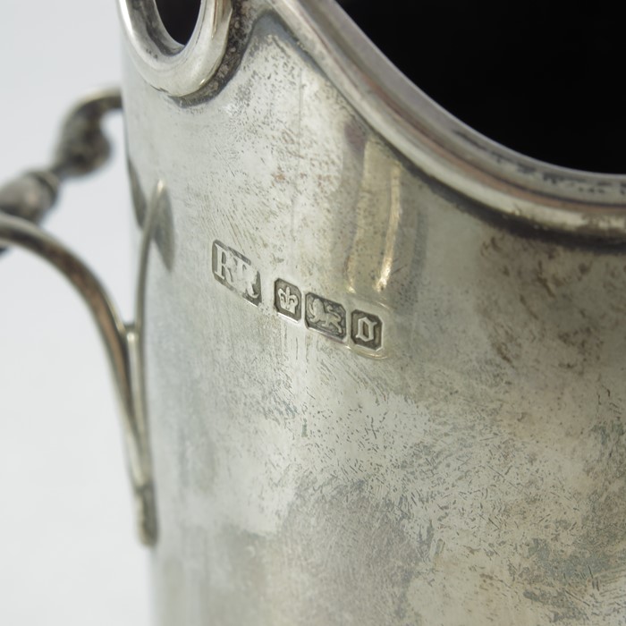 An Edwardian silver wine bottle holder, Richard Richardson, Sheffield 1906, sleeve form with twin ha - Image 2 of 3