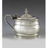 Nathan and Hayes, Chester 1905, an Edwardian silver mustard pot, ogee moulded oval form, bright cut
