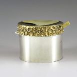 Stuart Devlin, London 1971, a Modernist silver and parcel gilt mustard pot and spoon, cylindrical fo