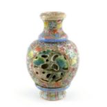 A small Chinese famille rose reticulated vase, Qianlong mark in kaishu script