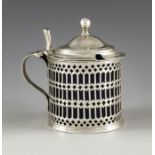 M I N, Lisbon circa 1805, a Portuguese silver mustard pot and spoon, cylindrical form, reticulated a