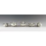 Five English silver mustard pots, with date marks from 1905 to 1918, various makers, Birmingham, Che