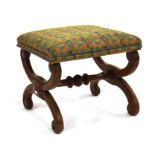 A Victorian walnut foot stool