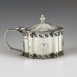 William Comyns and Sons, London 1931, a George V silver mustard pot, straight sided ogee form, retic