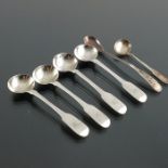A set of four William IV English Provincial silver salt spoons and three George IV condiment spoons