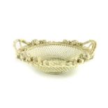 Belleek second period three strand woven round basket,