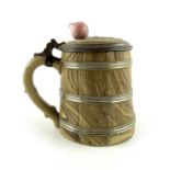 Mettlach, Villeroy and Boch, a half litre stein, relief moulded in the form of a barrel