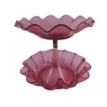 A Victorian cranberry glass two tier epergne