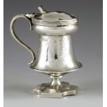 Omar Ramsden, London 1927, an Arts and Crafts silver mustard pot, planished pedestal knopped and bla