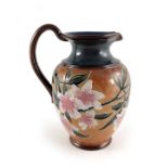 A Royal Doulton for Art of Union London stoneware jug, shouldered form, relief moulded with blossom