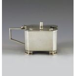 Charles Boyton, London 1934, an Art Deco silver mustard pot, planished cuboid form, with chamfered e