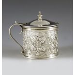 Finley and Taylor, London 1889, an Arts and Crafts silver mustard pot, cylindrical form, decorated w