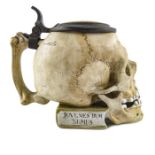 E Bohne Soehne, a novelty character stein, realistically modelled as a skull on a book