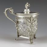 R & G, Continental 19th century, an Empire style silver mustard pot, cast and reticulated three pila