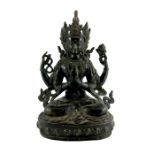 A Sino Tibetan Buddhist bronze figure or Shadakshari Avalokiteshvara