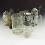 Seven various glass steins, third and half litre