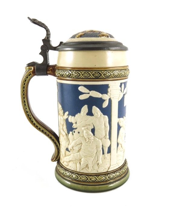 Johann Baptist Stahl for Mettlach, Villeroy and Boch, a half litre stein, relief moulded in the Blac - Image 2 of 7