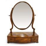 A George III mahogany and satinwood strung swing toilet mirror