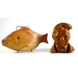 A treacle glazed stoneware character jug together with a Brampton salt glazed stoneware fish flask