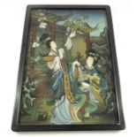 A pair of Chinese reverse painted glass pictures