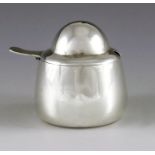 Archibald Knox for Liberty and Co., Birmingham 1904, an Arts and Crafts Cymric silver mustard pot, r