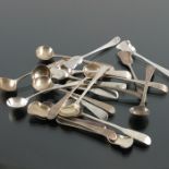 A collection of George III and later silver salt spoons and shovels