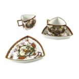 A pair of Dresden, Meissen style cups and saucers
