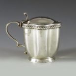 Frederick Augustus Burridge, London 1905, an Edwardian silver mustard pot, lobed beaker form with co
