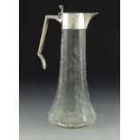 A Victorian silver mounted and cut glass claret jug