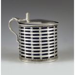 Daniel and John Wellby, London 1902, an Edwardian silver mustard pot, reticulated cylindrical form w