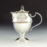 W A S Benson, an Arts and Crafts silver plated hot water jug and lid