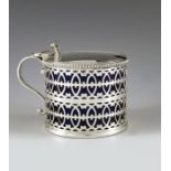 C J Vander, London 1919, a George V silver mustard pot, reticulated cylindrical form, interlocking C