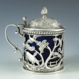 Thomas of New Bond Street, London 1912, a George V silver mustard pot, cylindrical form, reticulated